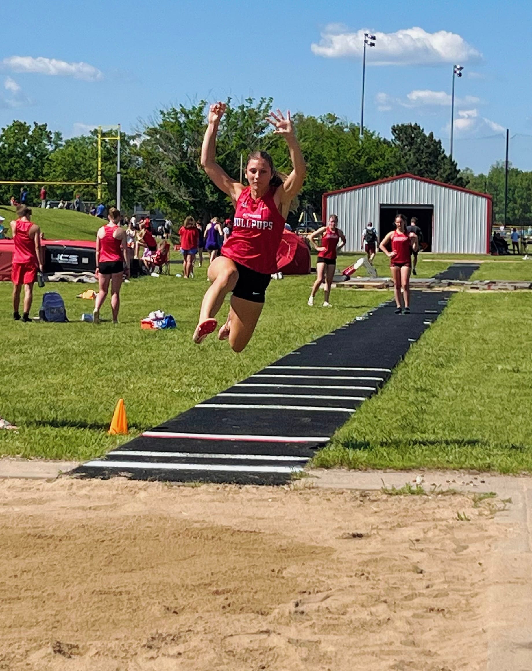 BULLPUP TRACK TEAMS SHINE AT HESSTON MEET