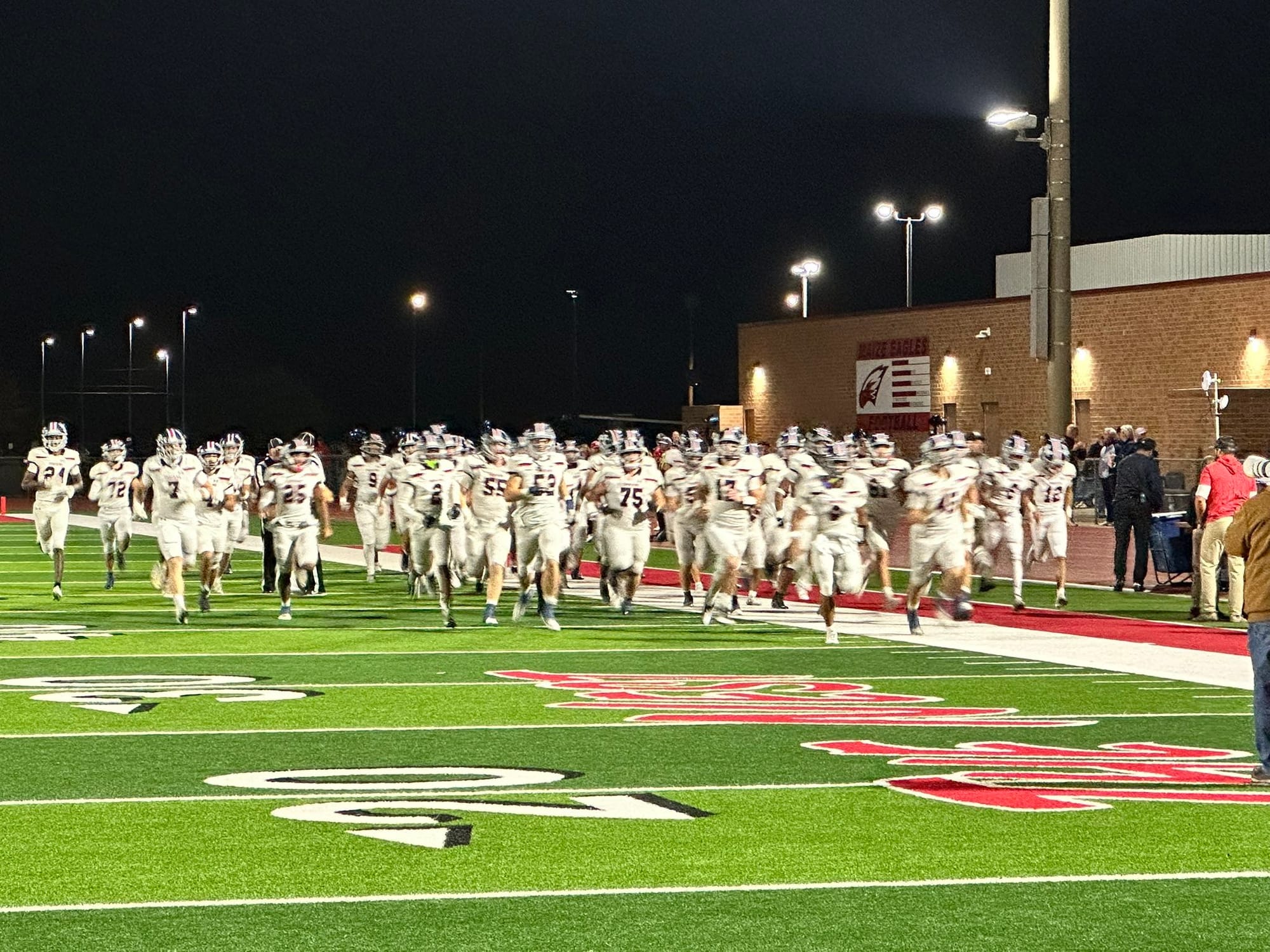 Manhattan Indians Crush Maize 55-31 in Playoff Victory