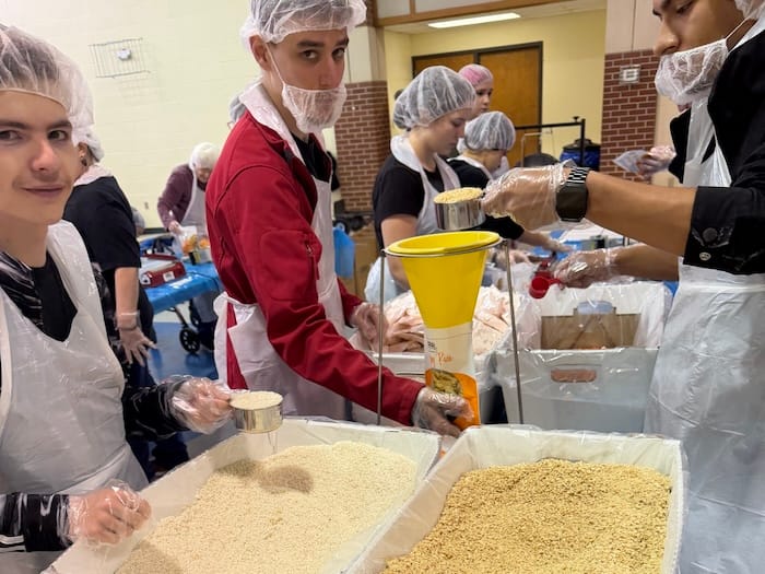 Cowley College Students, Volunteers Package 20,000 Meals for Local Food Pantries