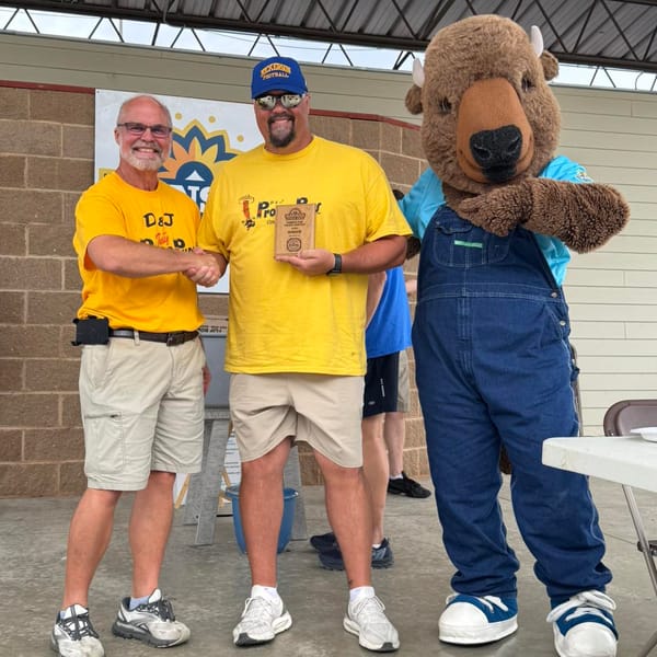 High School Teacher Sets New Kansas State Fair Record in Pronto Pup Eating Contest